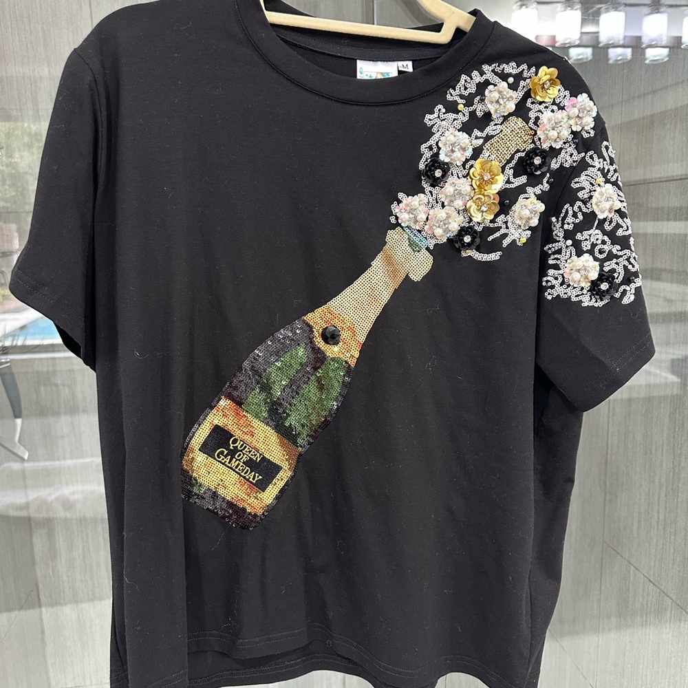 QUEEN OF SPARKLES Black Top with Gold and Green Champagne Design